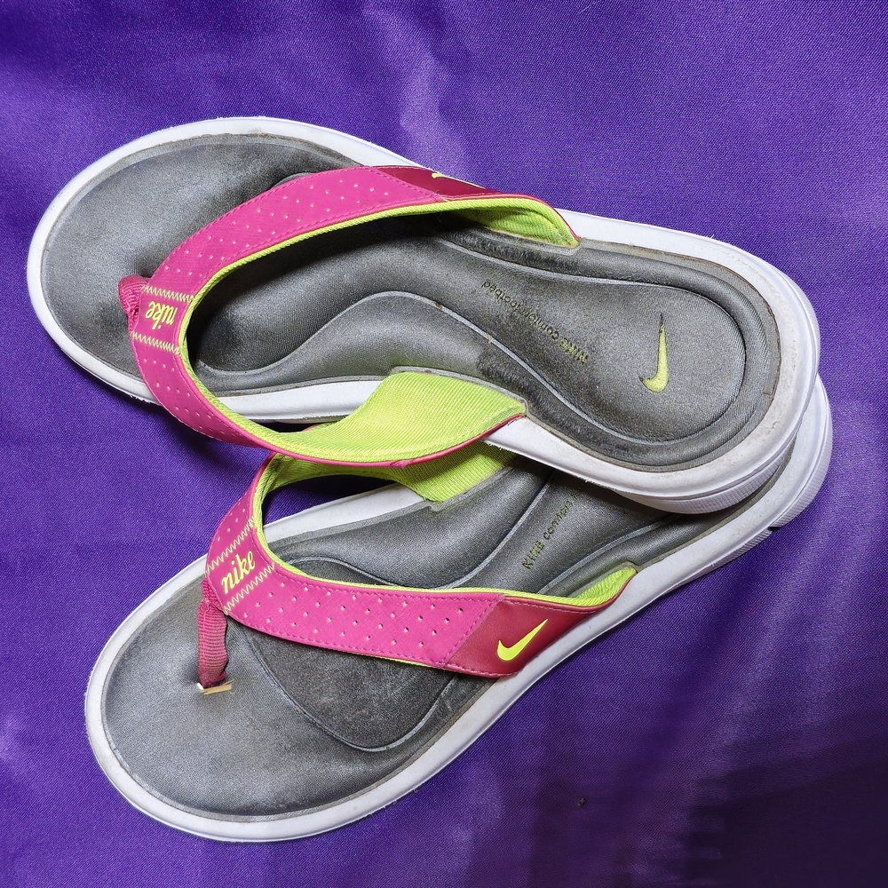 Nike Women's Pink and Gray Flip Flops.